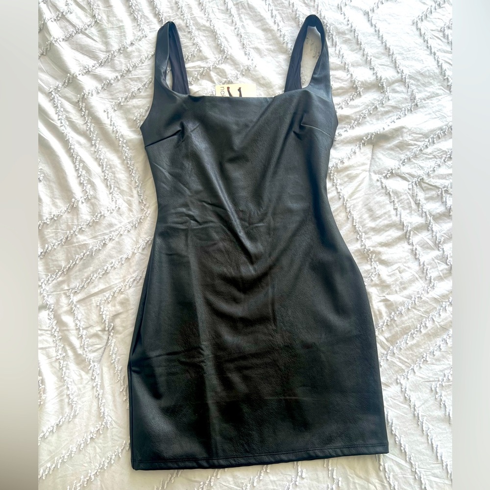Naked wardrobe black faux leather dress.